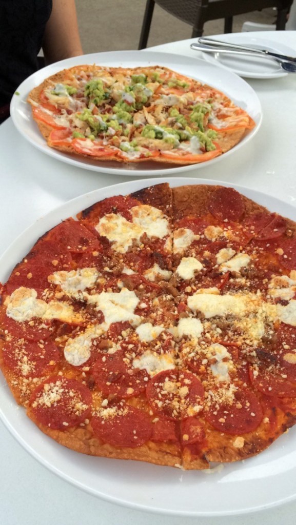 up front: Mackenzie's spicy Italian flat-bread and my chicken avocado 